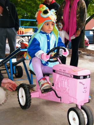 Rain doesn't affect fall festival Leah Esposito, 4, of Hampton won second place in her division for children of 40 pounds or younger with a distance of 4'5".