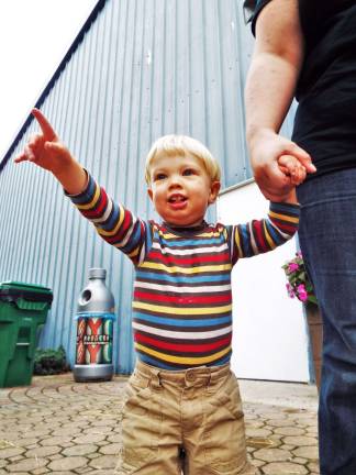 Sussex Christian school holds harvest festival One-year-old Thomas Jones of Green township points to the festivities at the Sussex Christian School's annual Harvest Festival Saturday, Oct. 1.