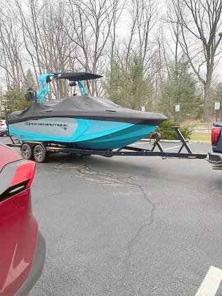 Heads turned as a boat full of toys arrived at the Project Self-Sufficiency campus last Wednesday (Photo by Laurie Gordon)