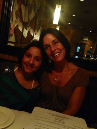Caren Johnson and daughter Lauren Scarzafava of Goshen. &quot;To the moon and back. We just love to be together. Out to dinner at our favorite place.&quot;
