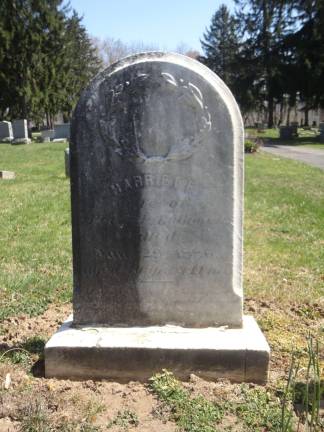 DAR cemetery dig The second part of the DAR's mission was to clean the fungus off the old gravestones. Here, half of DAR member Lisa Permunian's ancestor Harriet F. Babcock's stone has been cleaned with a safe and effective solution called D/2.