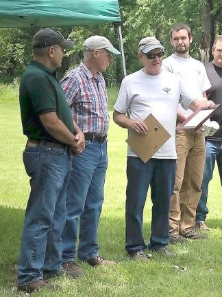 Elmer Platz receives recognition for his work in forest management.