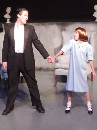 Kyle Penny and Sadie Donnelly as Daddy Warbucks and Annie.