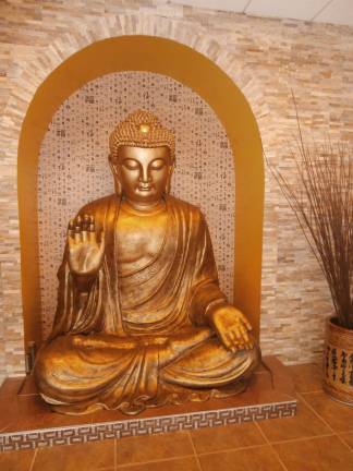 Wings Asian Fusion Bistro opens in Vernon Photos by Karen Daley A giant, gloden Buddha welcomes guests to Wings Asian Fusion Bistro.