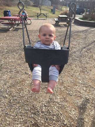 Photo, Trish Gondelman of Sparta Lucas is swinging and enjoying a spring day at the park.