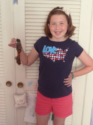Sussex girl donates hair for cancer victims