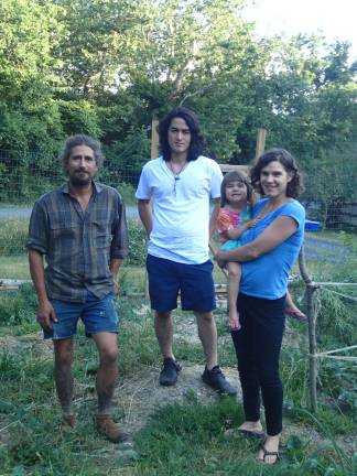From left: Garden geeks Jamie Lanza and Raphael Cox, and Becca Tucker, editor of Dirt, with daughter Kai Gara. They got together at Tucker's garden in Chester to put their heads together in advance of the tour. Photo by Joe Gara