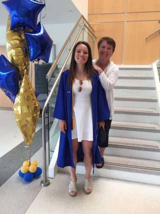 Sparta woman to run 4,000 miles to raise funds for young adults with cancer Claire at her graduation from the University of Delaware