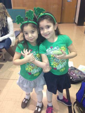 Celebrating St. Patrick's Day Sandra Andrade of Sparta, N.J. "Natalie and Amanda showing off their St. Patrick's Day spirit at Alpine School."