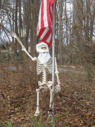 Highland Lakes' Mr. Bones is back from his Halloween gig. Now he is the jolly old elf minus the plumpness.