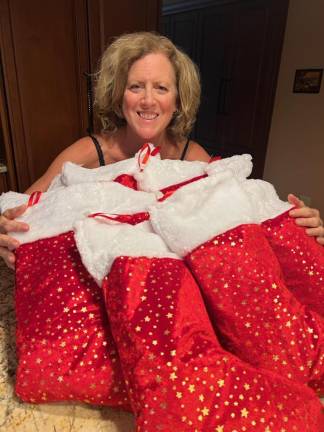 Vernon. Vernon Township Woman’s Club donates Christmas stockings Vernon. Vernon Township Woman’s Club donates Christmas stockings
