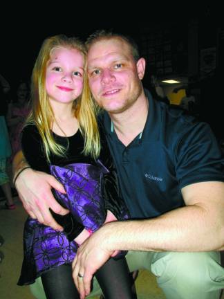 Grace Thomas, 5, is shown with her father Eric Thomas of Wantage.
