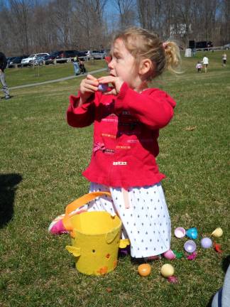 Journey Lain was excited to fine candy in her egg from the hunt at Woodbourne Park on Saturday.