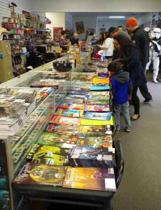 Visitors look through the free comics that were available.