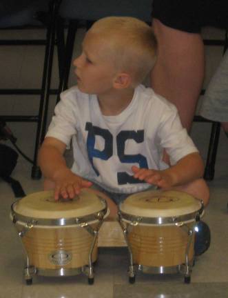 Library hosts drum circle Young and old were jamming.