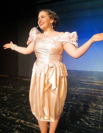 Photo by Viktoria-Leigh Wagner Senior Brooke Sutton, 18 of Branchville makes a grand entrance as writer Benjy Stone's mother, Belle May Steinberg Carroca, during the musical number, &quot;Welcome to Brooklyn.&quot;