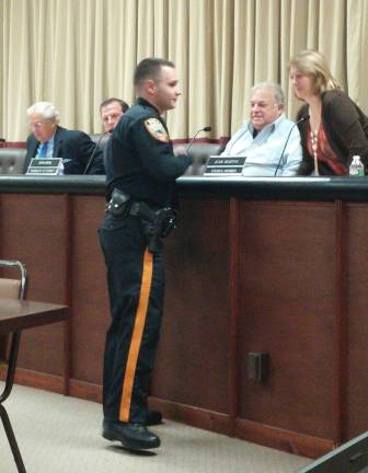 Recently hired police officer Sean Perry speaks to Vernon Township Councilwoman Jean Murphy on Monday, Sept. 28.