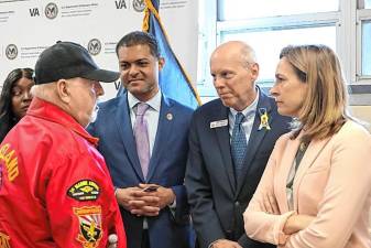 From left, a local veteran speaks with VA Undersecretary Shereef Elnahal, Morris County Commissioner John Krickus and Rep. Mikie Sherrill, D-11. (Photo provided)