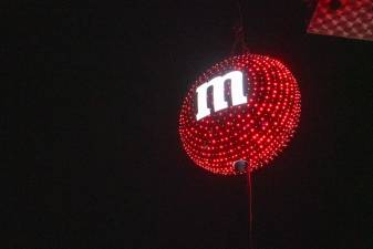 A red M&amp;M with 1,000 lights was lowered at midnight Monday, Jan. 1 in Hackettstown to celebrate the new year. The U.S. headquarters of Mars Wrigley, which makes M&amp;Ms, is based in Hackettstown as well as in Newark. (Photos by Nancy Madacsi)