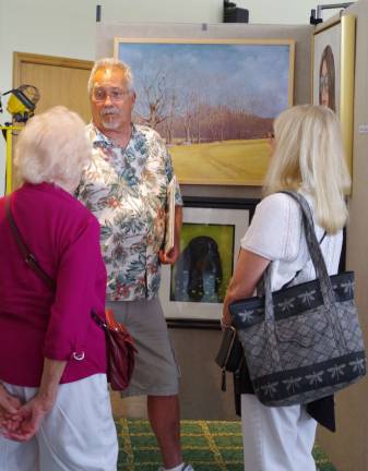 At center left, illustrator Bruce Young has mastered portraits. He also paints a variety of other subjects as well.