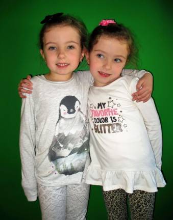 First-graders Grace and Savannah Cosenza, 6