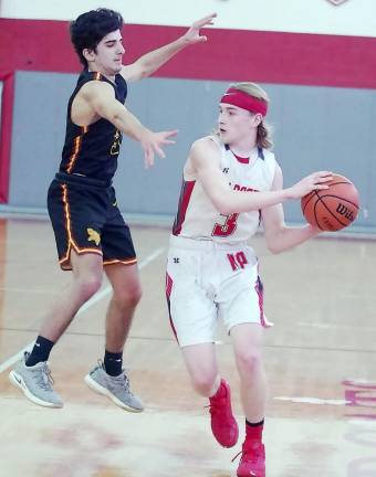 High Point's Connor Lake handles the ball while covered by Voorhees' James Memoli. Lake scored 5 points, grabbed 6 rebounds and accomplished 2 steals.