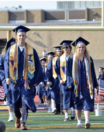 Vernon Township High School Class of 2024 Vernon Township High School salutatorian Zack Mountain and valedictorian Bailey Mann lead the Class of 2024 into graduation Wednesday, June 19. (Photo by Theresa Sabia)