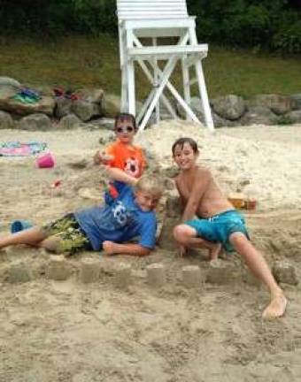 Alex, Matt and Everett enjoy White Lake beach at last year&#xfe;&#xc4;&#xf4;s K.E.E.P. Summer Camp.