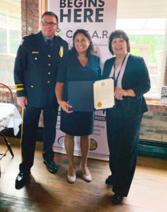 Newton Police Chief Michael Richards, Kellie Doucette, Becky Carlson