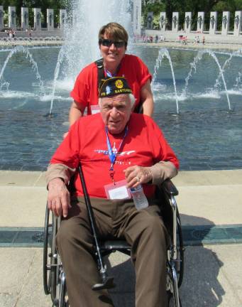 Lisa Smigen of Vernon is shown escorting Gerard Russo of Somers, N.Y., to Washington, D.C. on the Honor Flight.