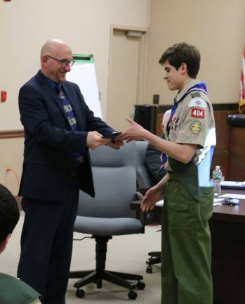 Mark Reilly of Vernon Boy Scout Troop 404 receives a proclamation from Mayor Harry Shortway recognizing his accomplishment in achieving the rank of Eagle Scout.