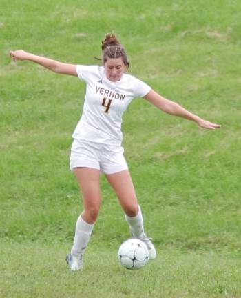Vernon's Sydney Bolcato is about to kick the ball.
