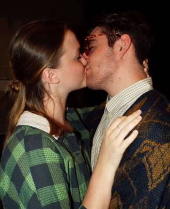 PHOTOS BY VIKTORIA-LEIGH WAGNER West Milford High School recent graduates Joseph Bellina, 18 and Megan Johnson, 17 portray the middle-aged couple of Joe and Meg Boyd in a passionate kiss. Seeking to win the pennant for his favorite baseball, Boyd sells his soul to the devil!