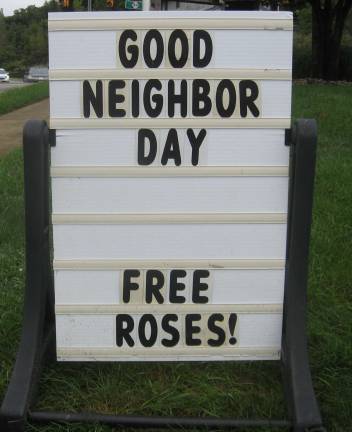 Highland Flowers remembered 9/11 by handing out free dozen rose bouquets in conjunction with Good Neighbor Day. The day's rule requires the rose recipient to keep one rose and give one to each neighbor.