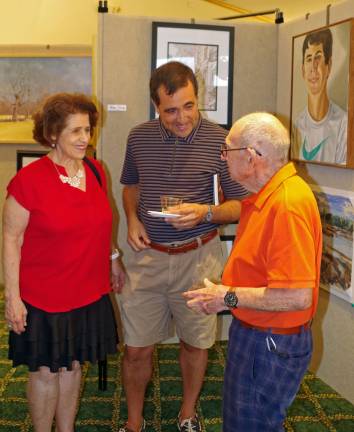 From the left are residents Lucy Grollman, artist Rick Perez, and world-renowned artist Philip Pearlstein.