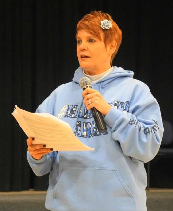 PHOTOS BY Dianne Grossman of Mallory's Army speaks at Glen Meadow Middle School.