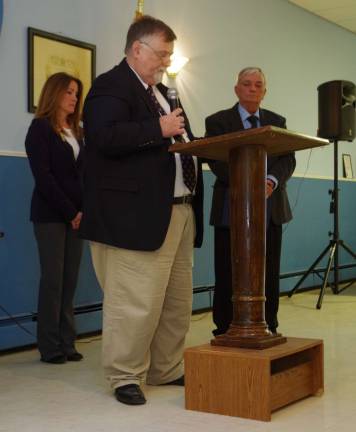 Sussex Elks honors Vernon resident John Harrigan Freeholder Phil Crabb is shown addressing the roughly 75 people who attended.