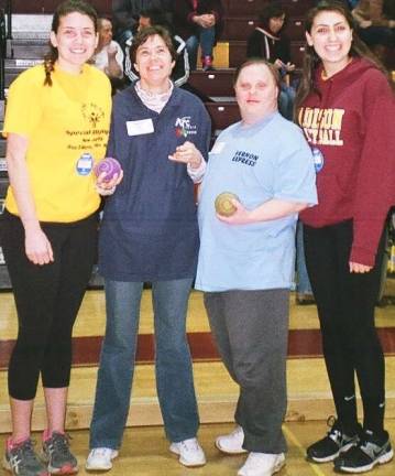 Among those on hand at the Area 3 Special Olympics Bocce Meet at Madison High School are, from left, Special Olympics volunteer Marissa Dias of Madison, Special Olympics athletes Kathy Tubby of Cedar Knolls and Glenn Heller of Vernon, and Special Olympics volunteer Taylor Camp of Madison.