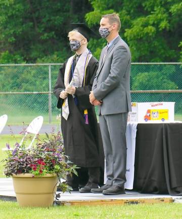 From right, Superintendent David Carr stands with Salutatorian Evan Wontor. (Photo by Vera Olinsky)