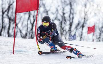 A skier speeds down the mountain during the 2nd Annual Hedda Memorial Race.