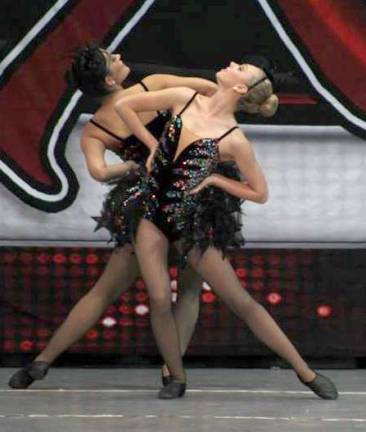 Renea rossi and Morgan Parker are shown during their duet.