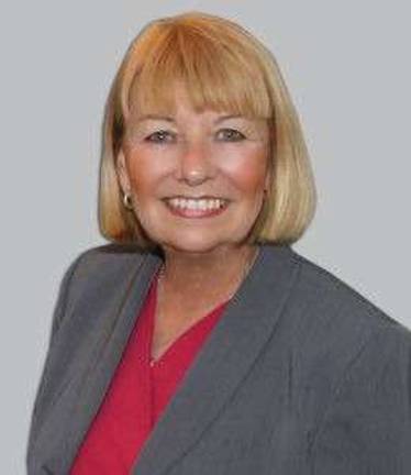 Real estate firm honors associates Linda Kroeger-Wilson