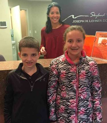 Children donate Halloween candy Children donate Halloween candy