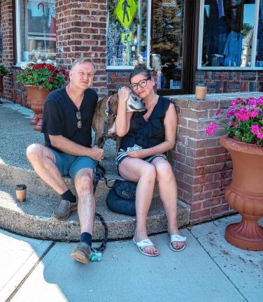 Sparta. Fourth of July events Greg and Margaret Kosciouek with their dog Kora.