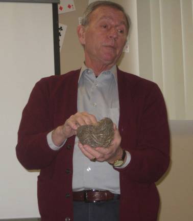 Master Gardener Caravella discusses the complicated nest building technique of an American robin.