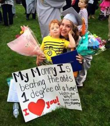 Chloe DeLuca-Knighton is shown with her son, Caleb.