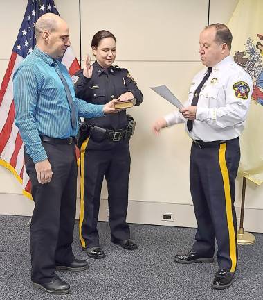 Two veteran correctional officers are promoted From left: Correctional Police Officer Corporal Jason Van Der Wende (husband of Corporal Van Der Wende), Corporal Jennifer Van Der Wende, and Sheriff Michael Strada (Photo provided)