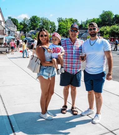 Sparta. Fourth of July events From left, Katelyn and Timothy KilkennyJr., Don Behake and TJ Kilkenny.