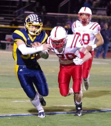 The Morris Hills defense go after Vernon ball carrier Michael Stefkovich.