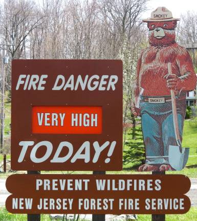 PHOTO BY CHRIS WYMAN As indicated by the New Jersey Forest Fire Service sign in front of the Barry Lakes Clubhouse, the fire danger for Wawayanda State Park and the mountaintop communities, as of Saturday, was still at the &#xfe;&#xc4;&#xfa;Very High&#xfe;&#xc4;&#xf9; level. The only danger level that is higher is &#xfe;&#xc4;&#xfa;Extreme.&#xfe;&#xc4;&#xf9; Although some rain was forecast for this week, residents should be watchful of smoke coming from the forest and notify authorities without any delay.